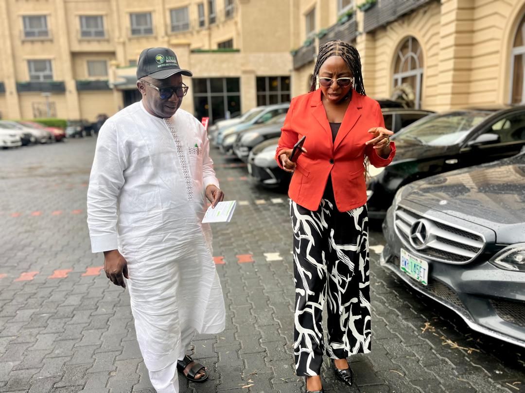 Keselash Agricom consultant walking and briefing a partner on location